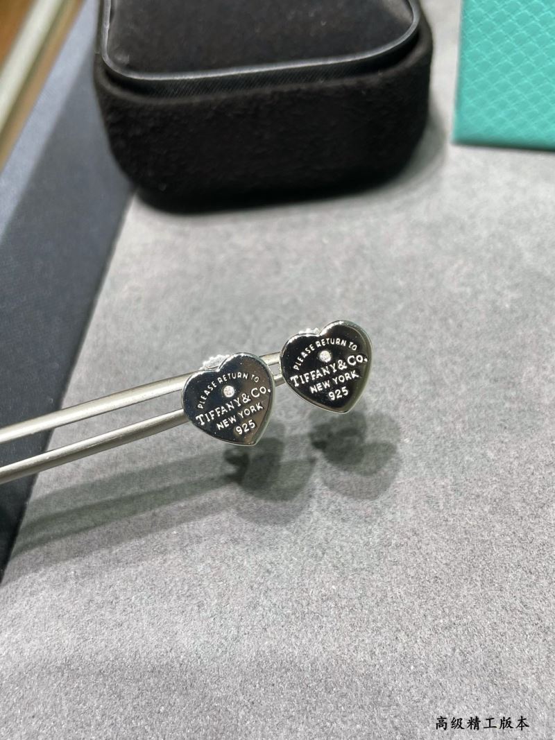 T*f*ny earrings
